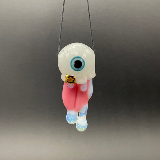 Glow in the dark eye pendant