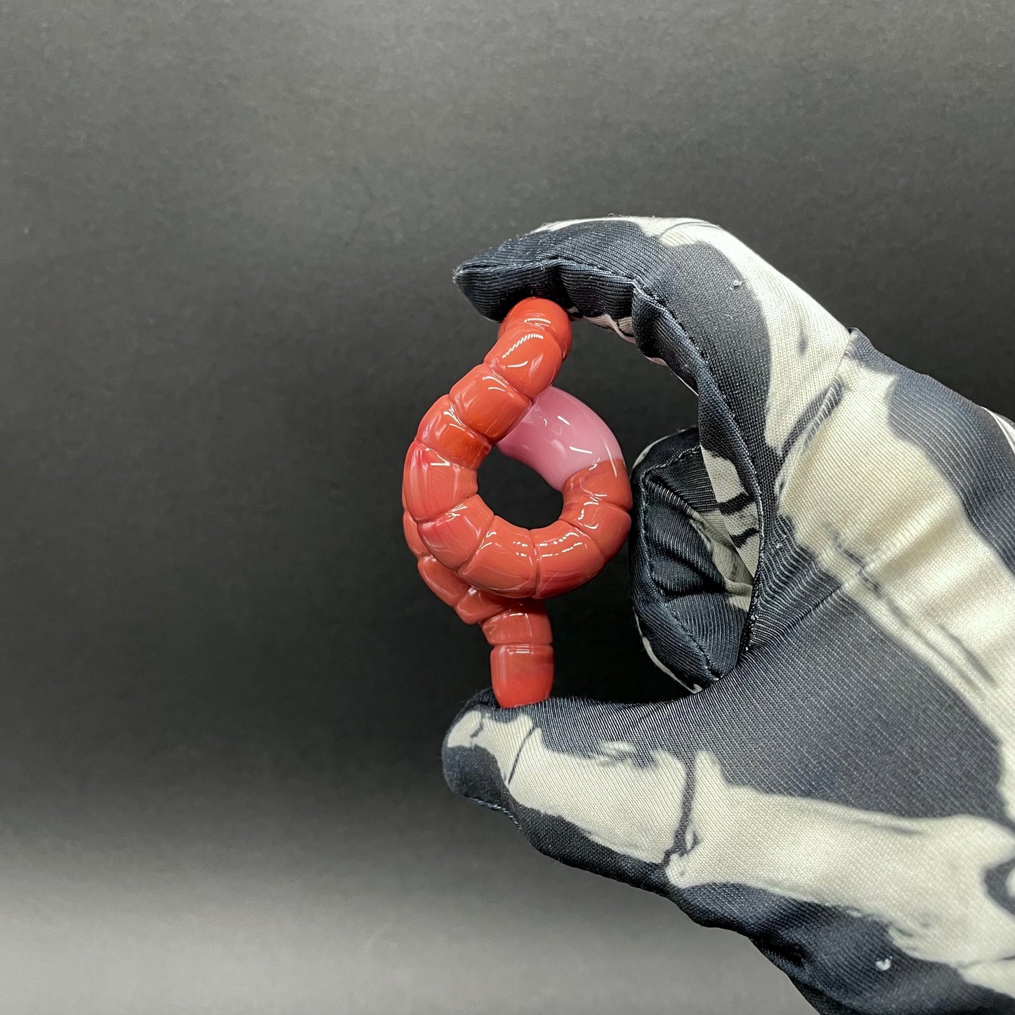 glass earthworm pendant