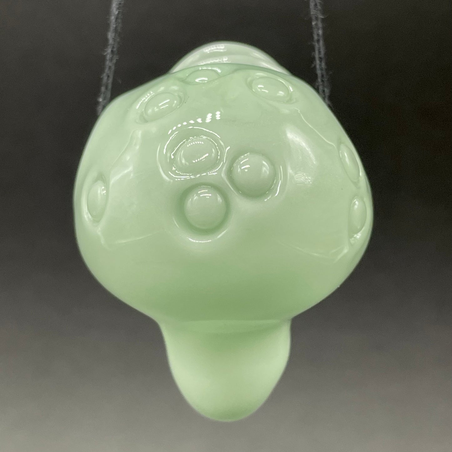 Time manipulating three eye glass alien pendant