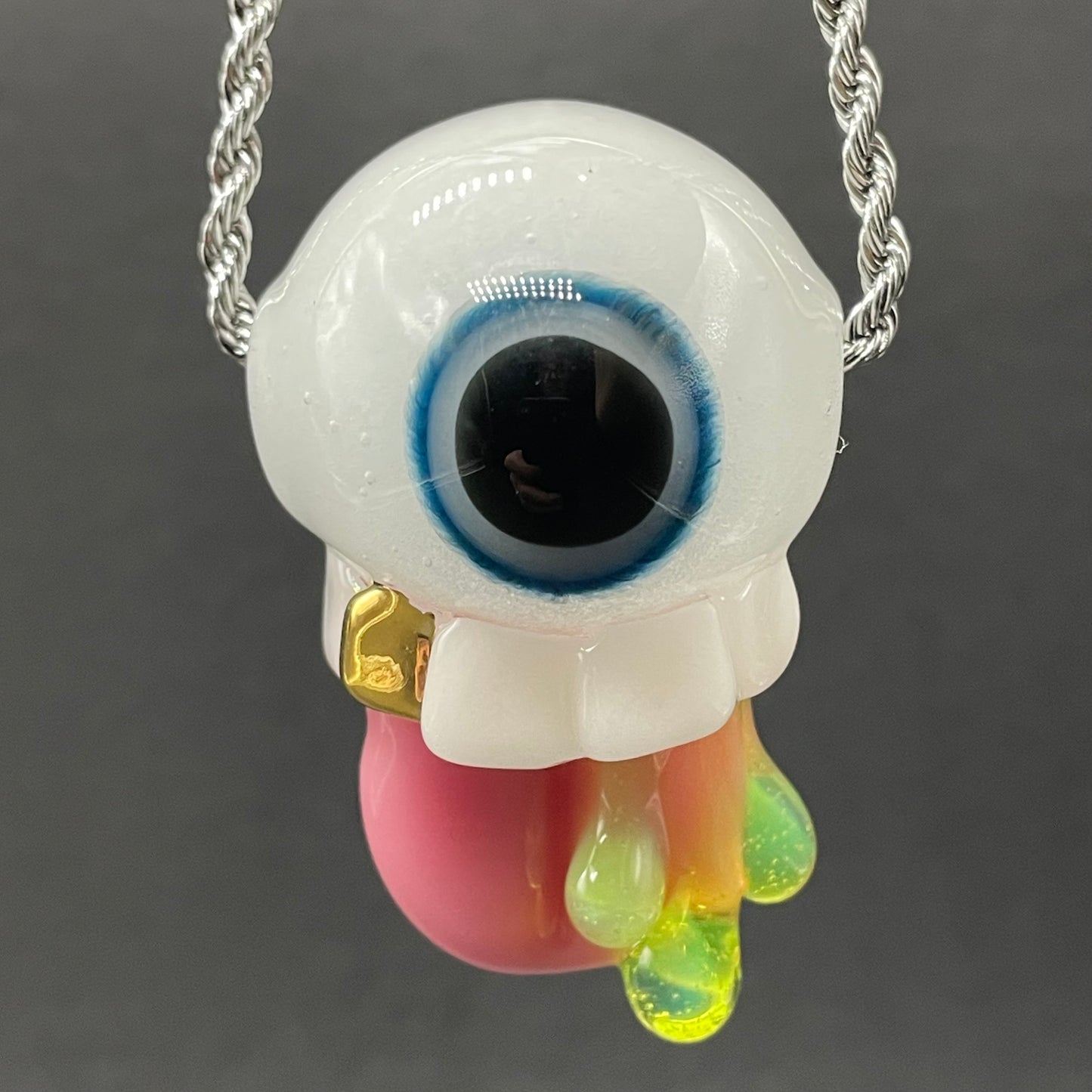 Glow in the dark eye pendant