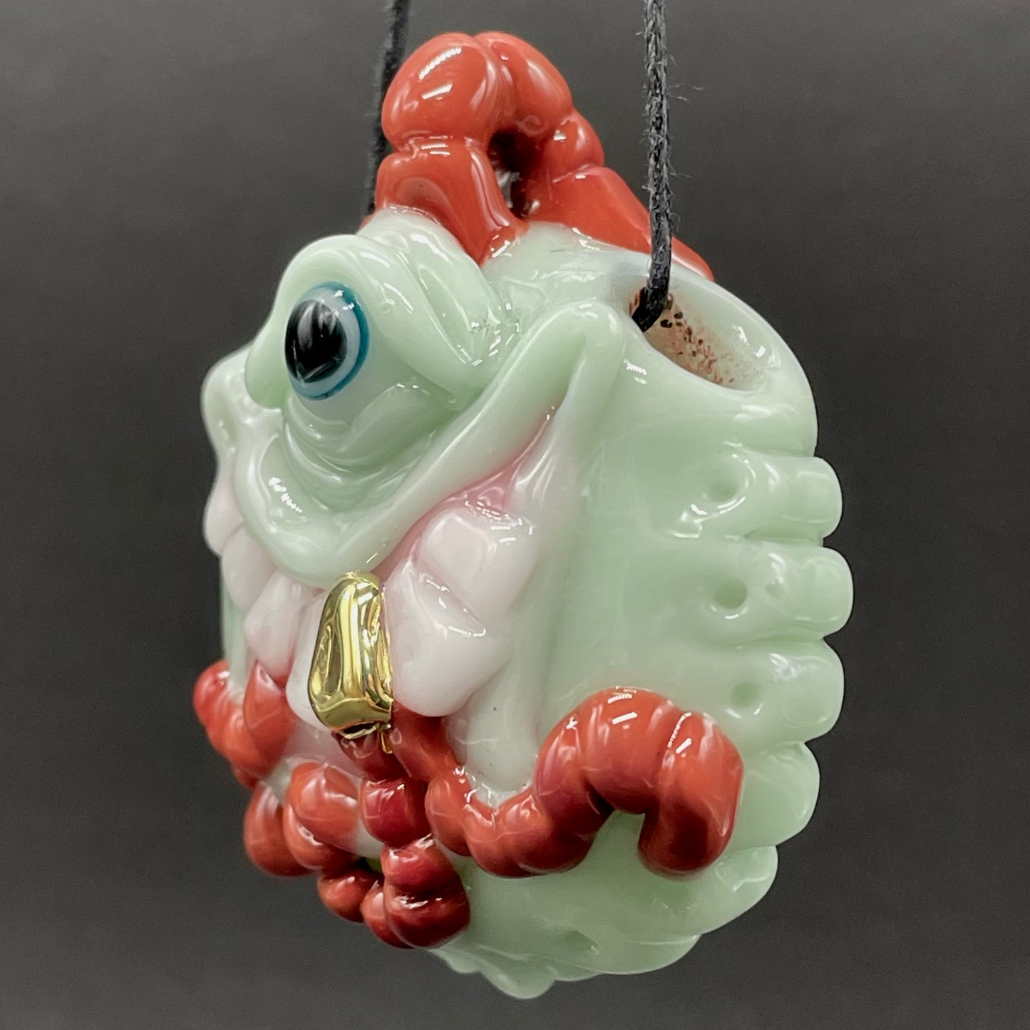 Worm eater pendant