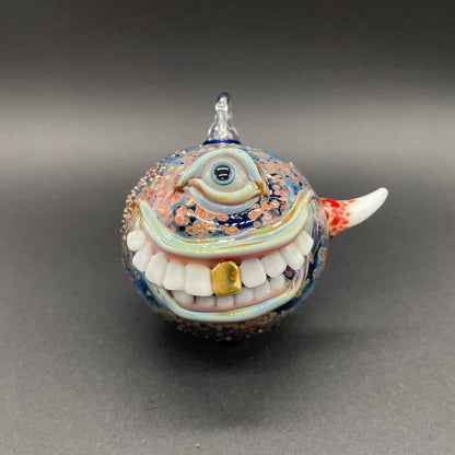 Smiling cyclops ornament