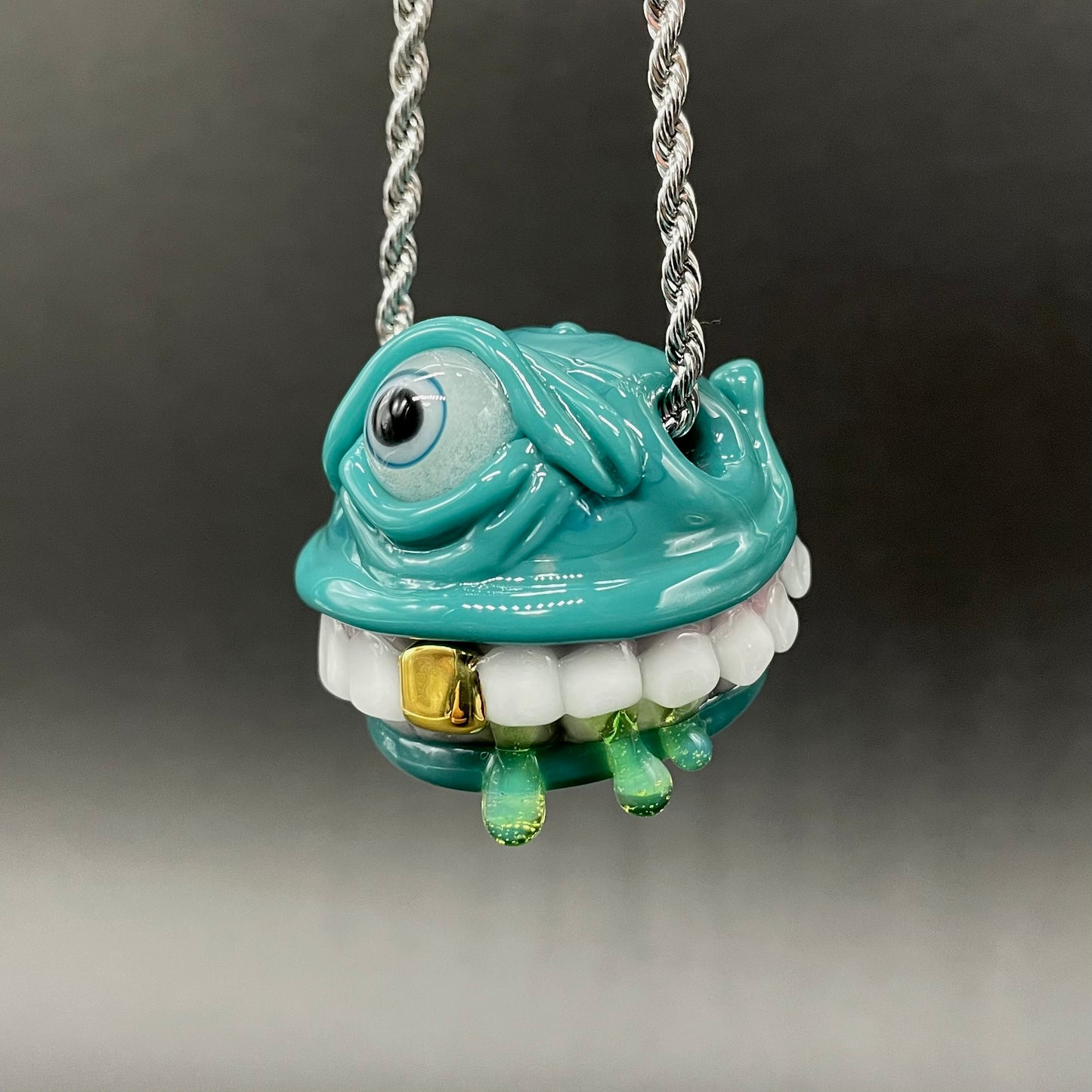 Grinning like a fool glass pendant