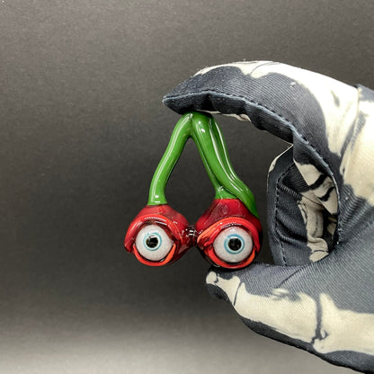Cherry flavored glass eye pendant