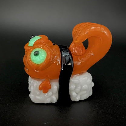 Mutant three eyed fish sushi glass pendant