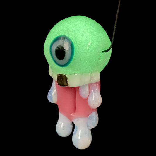 Glow in the dark eye pendant