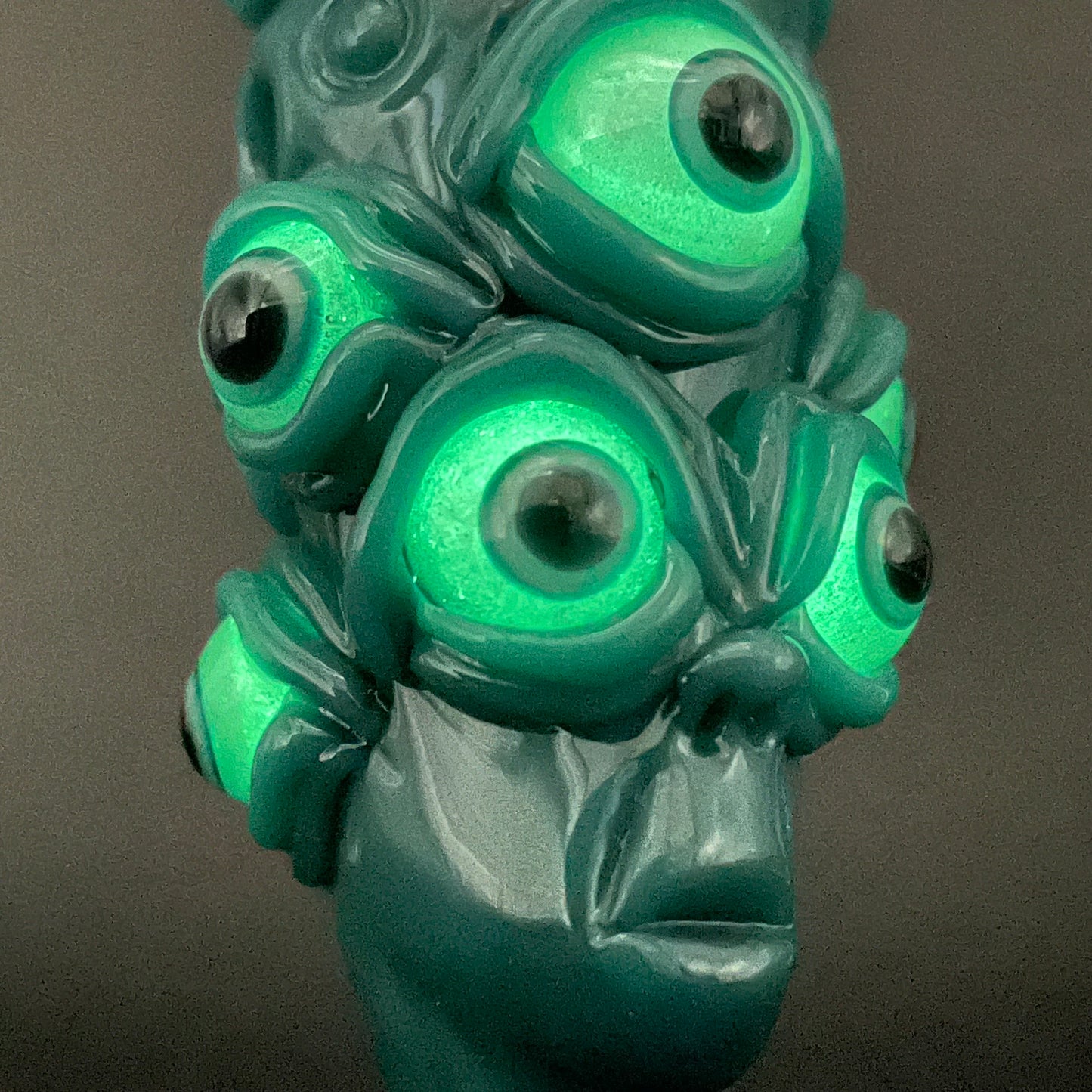 The Never-Blinking One glass effigy pendant