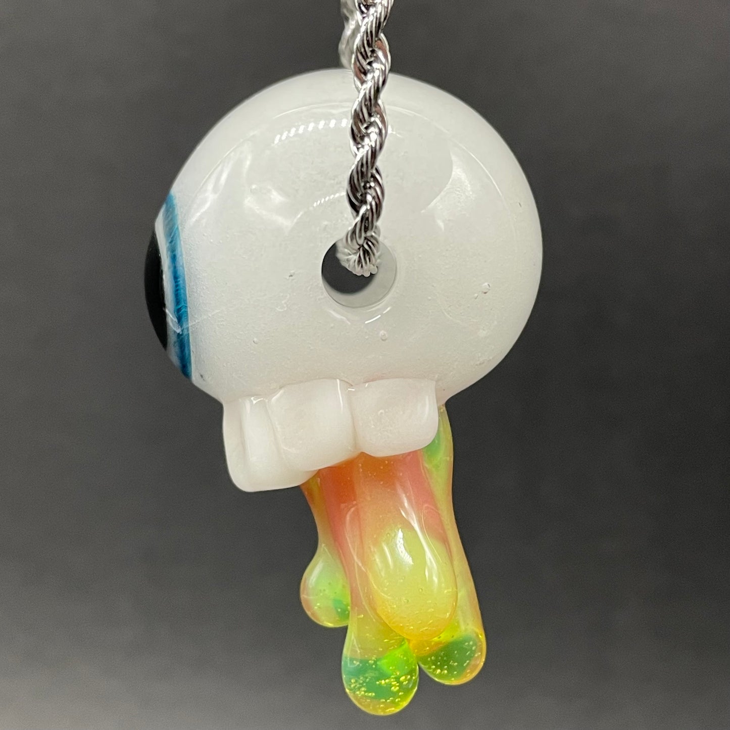 Glow in the dark eye pendant