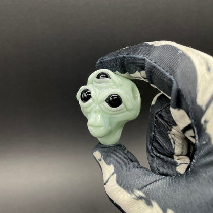 Time manipulating three eye glass alien pendant