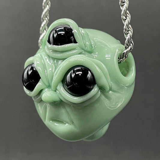 Time manipulating three eye glass alien pendant