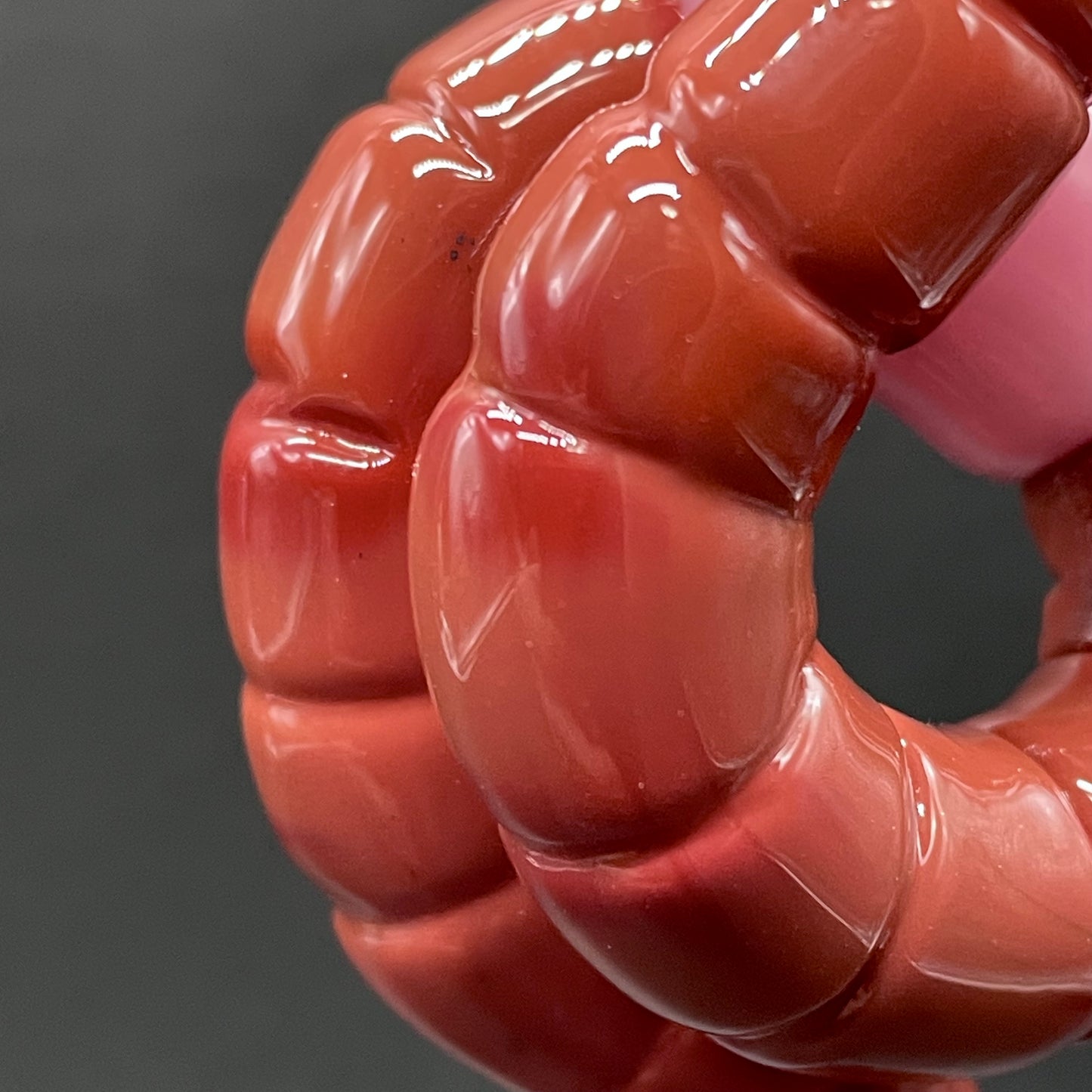 glass earthworm pendant