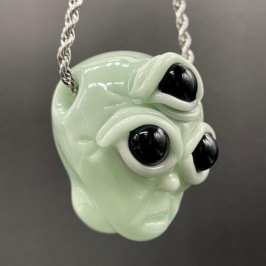 Time manipulating three eye glass alien pendant