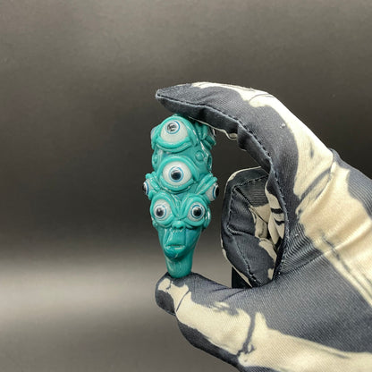 The Never-Blinking One glass effigy pendant