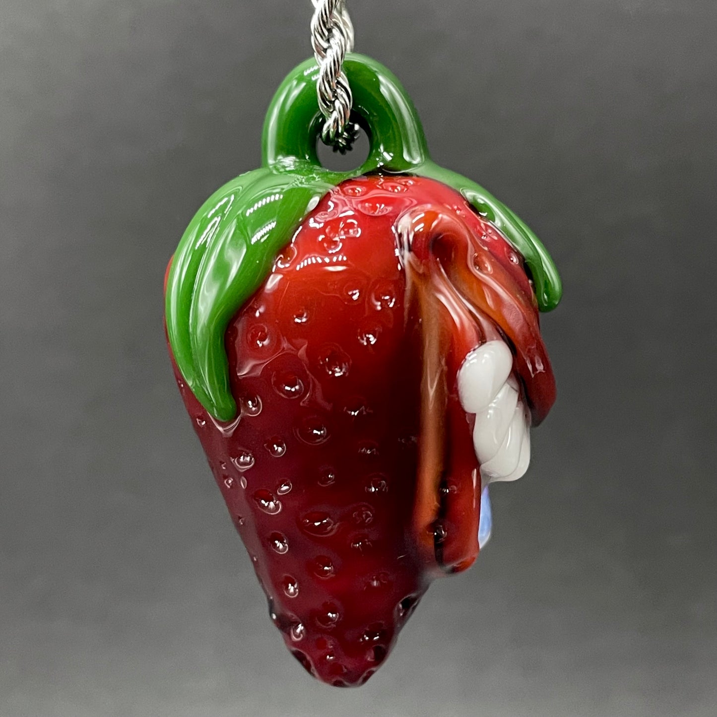 Toothy strawberry pendant