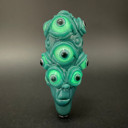 The Never-Blinking One glass effigy pendant