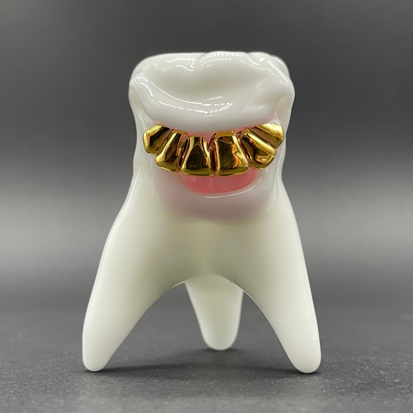 Tooth ache glass pendant