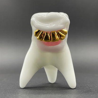 Tooth ache glass pendant