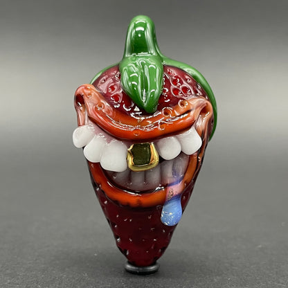 Toothy strawberry pendant