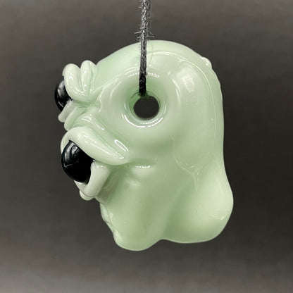 Time manipulating three eye glass alien pendant