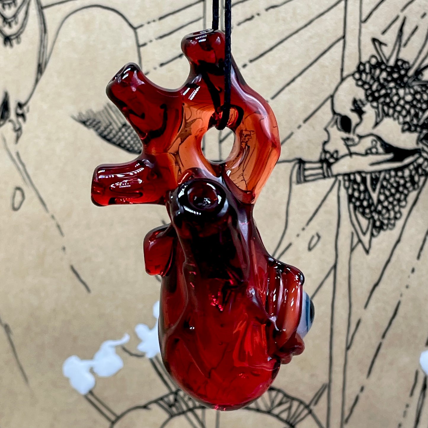 Anatomical cyclops heart pendant