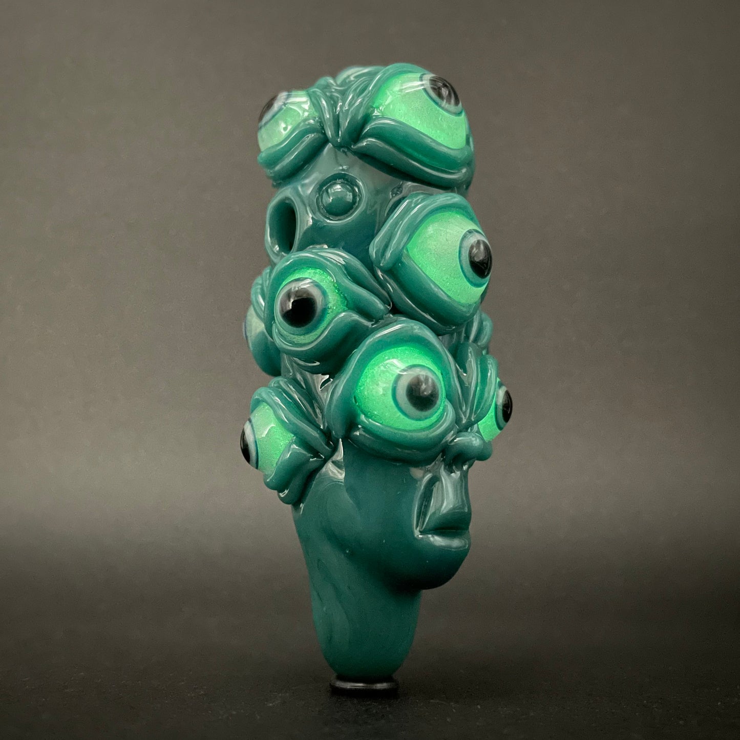 The Never-Blinking One glass effigy pendant