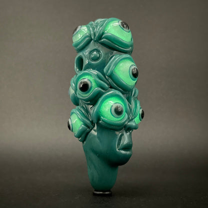 The Never-Blinking One glass effigy pendant