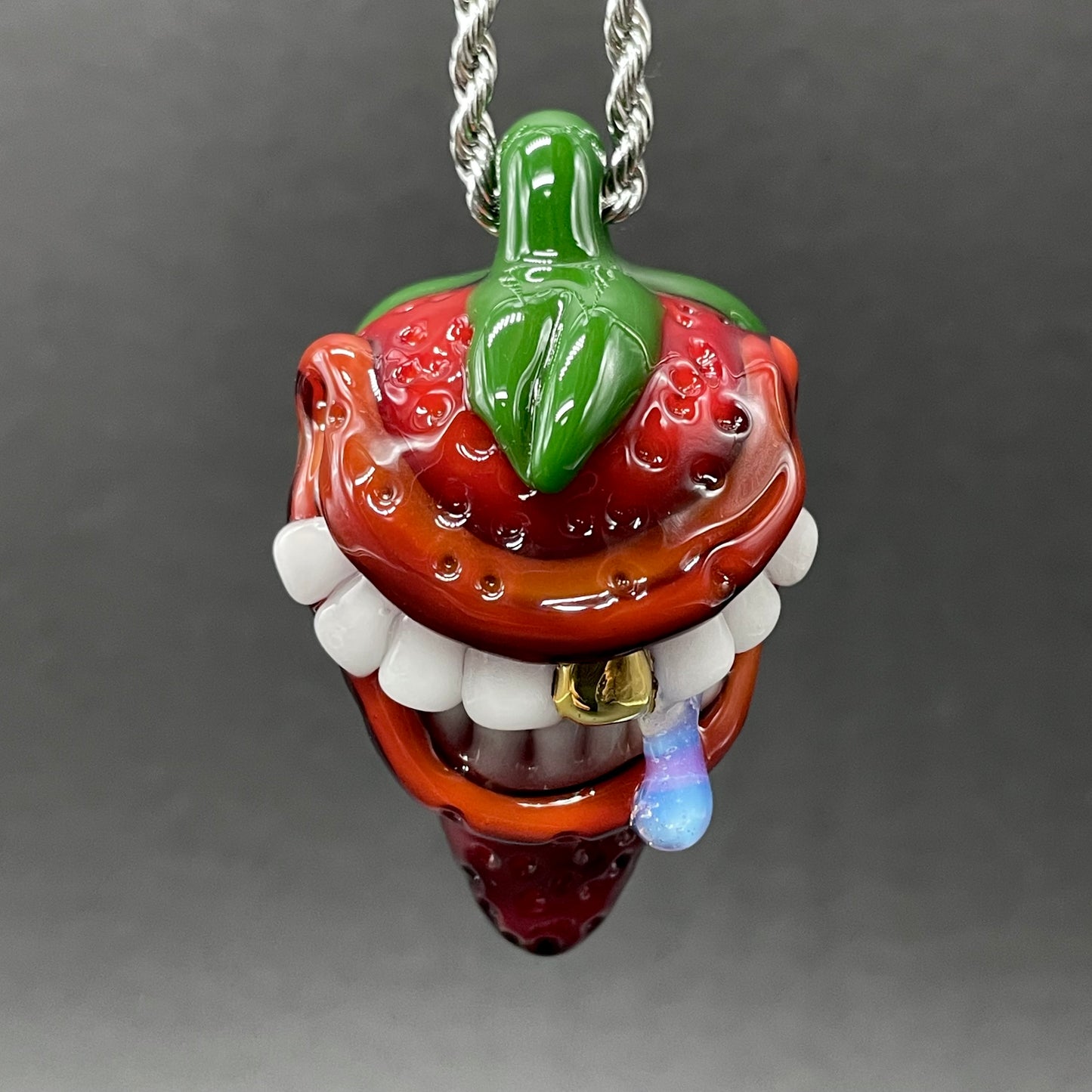 Toothy strawberry pendant