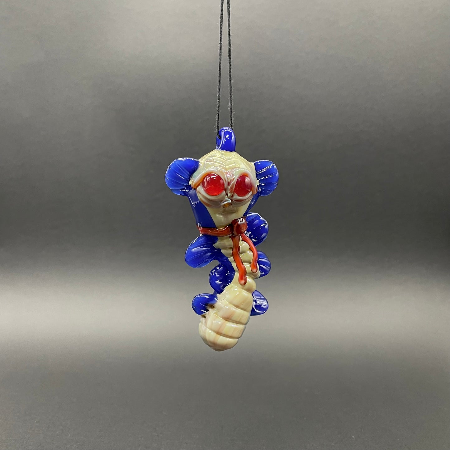 Labyrinth worm pendant