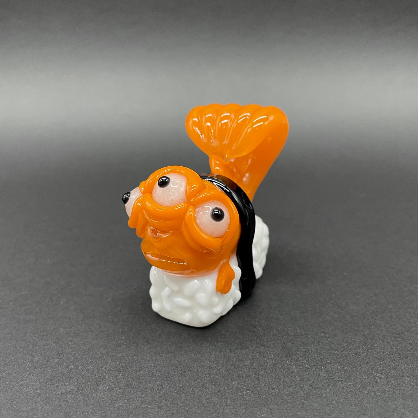 Mutant three eyed fish sushi glass pendant