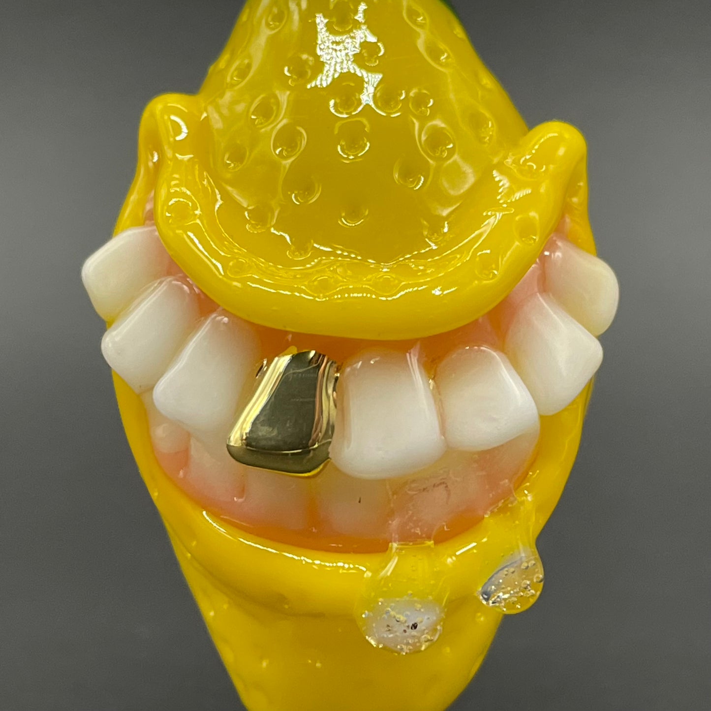 Grinning lemon pendant