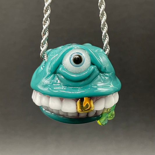 Grinning like a fool glass pendant