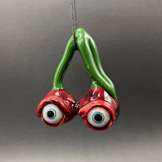Cherry flavored glass eye pendant