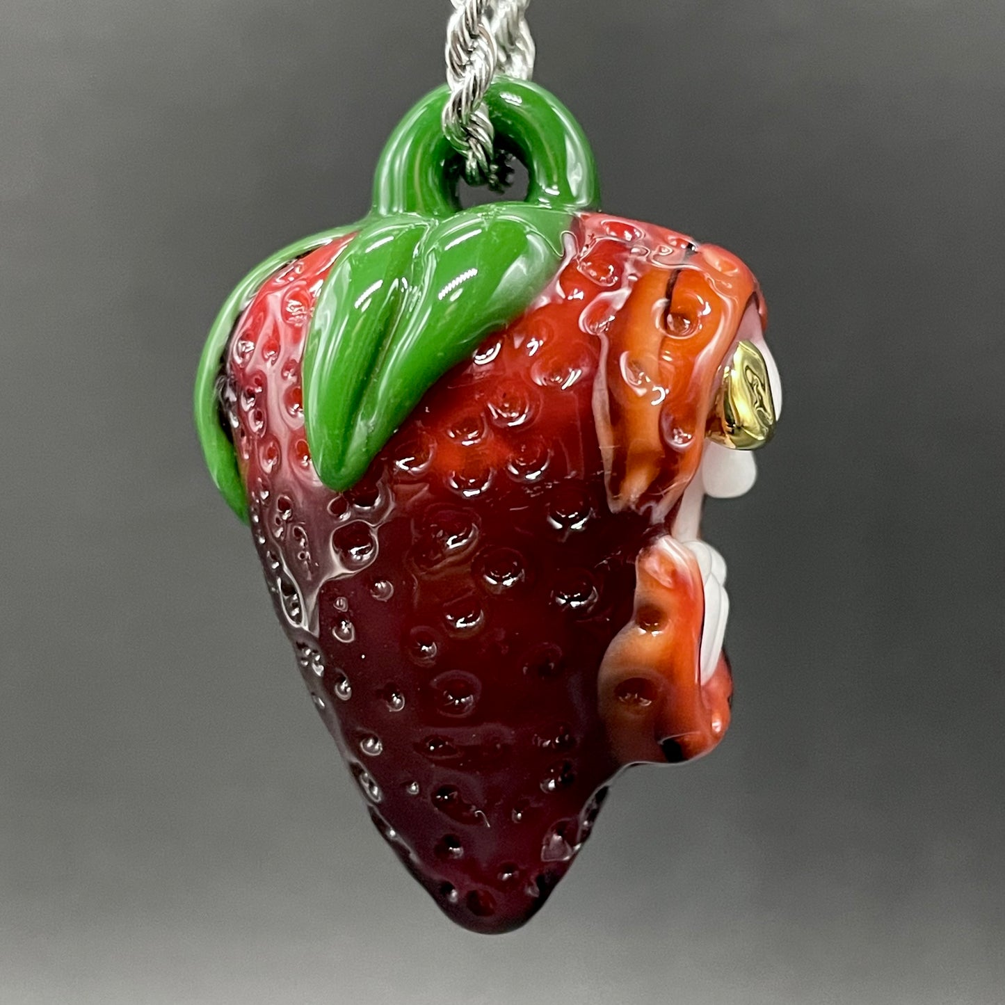 Screaming strawberry glass pendant