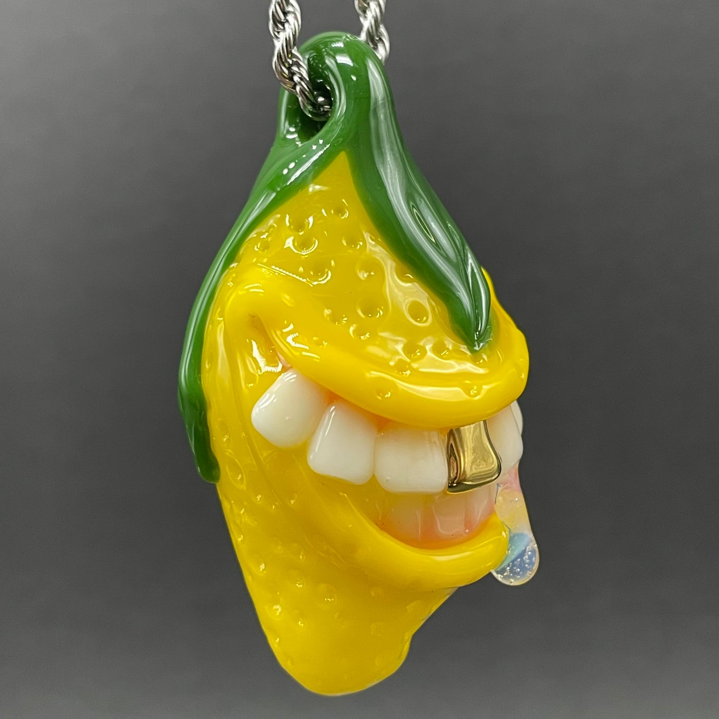 Grinning lemon pendant