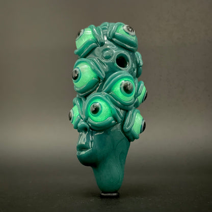 The Never-Blinking One glass effigy pendant