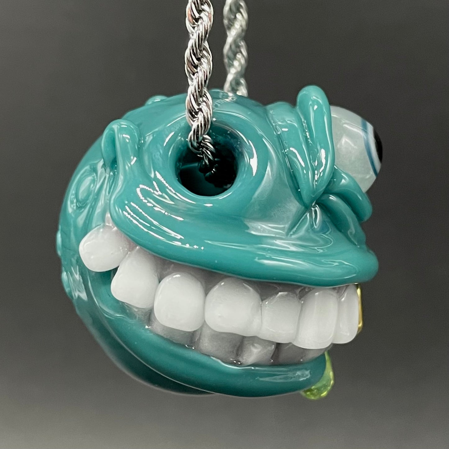 Grinning like a fool glass pendant