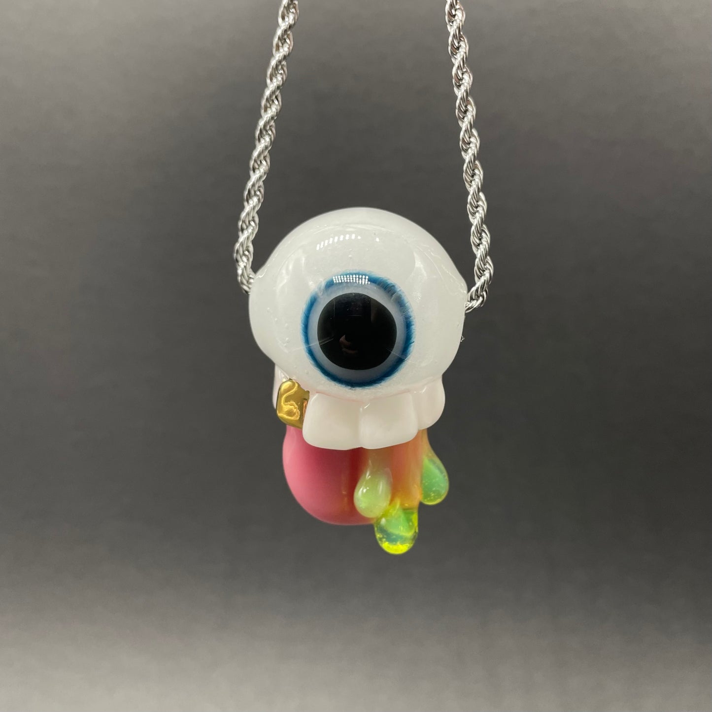 Glow in the dark eye pendant