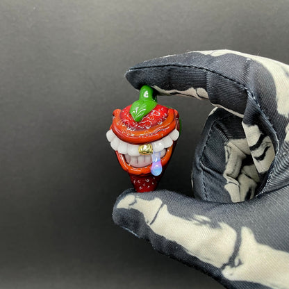 Toothy strawberry pendant