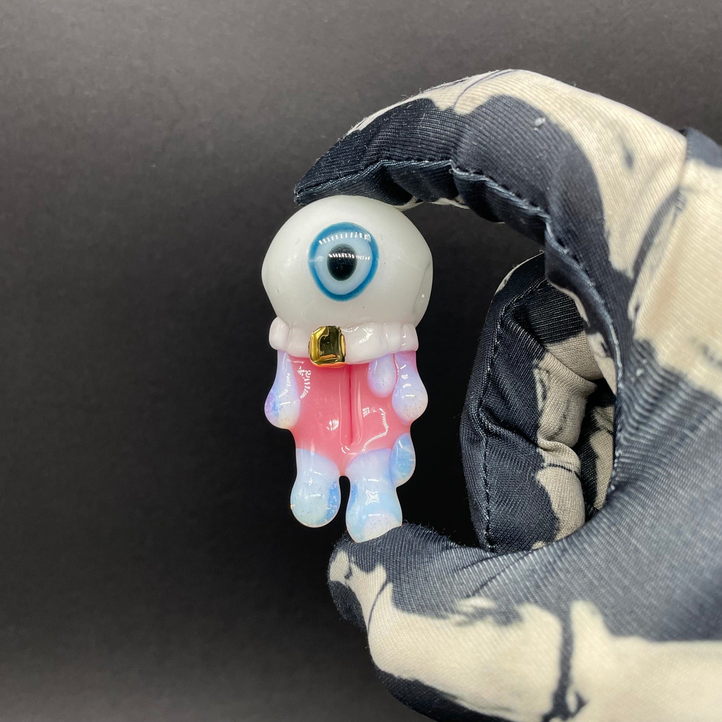 Glow in the dark eye pendant