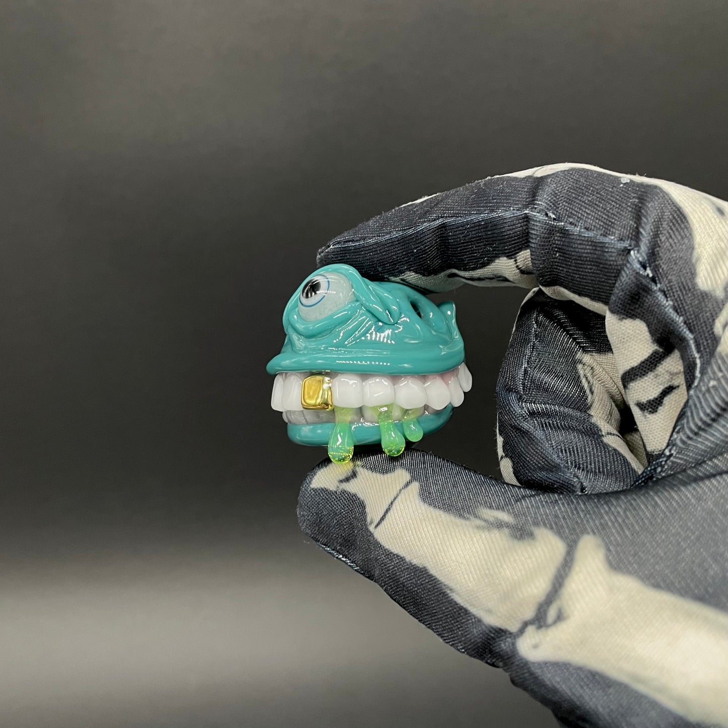 Grinning like a fool glass pendant