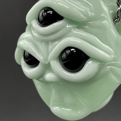 Time manipulating three eye glass alien pendant