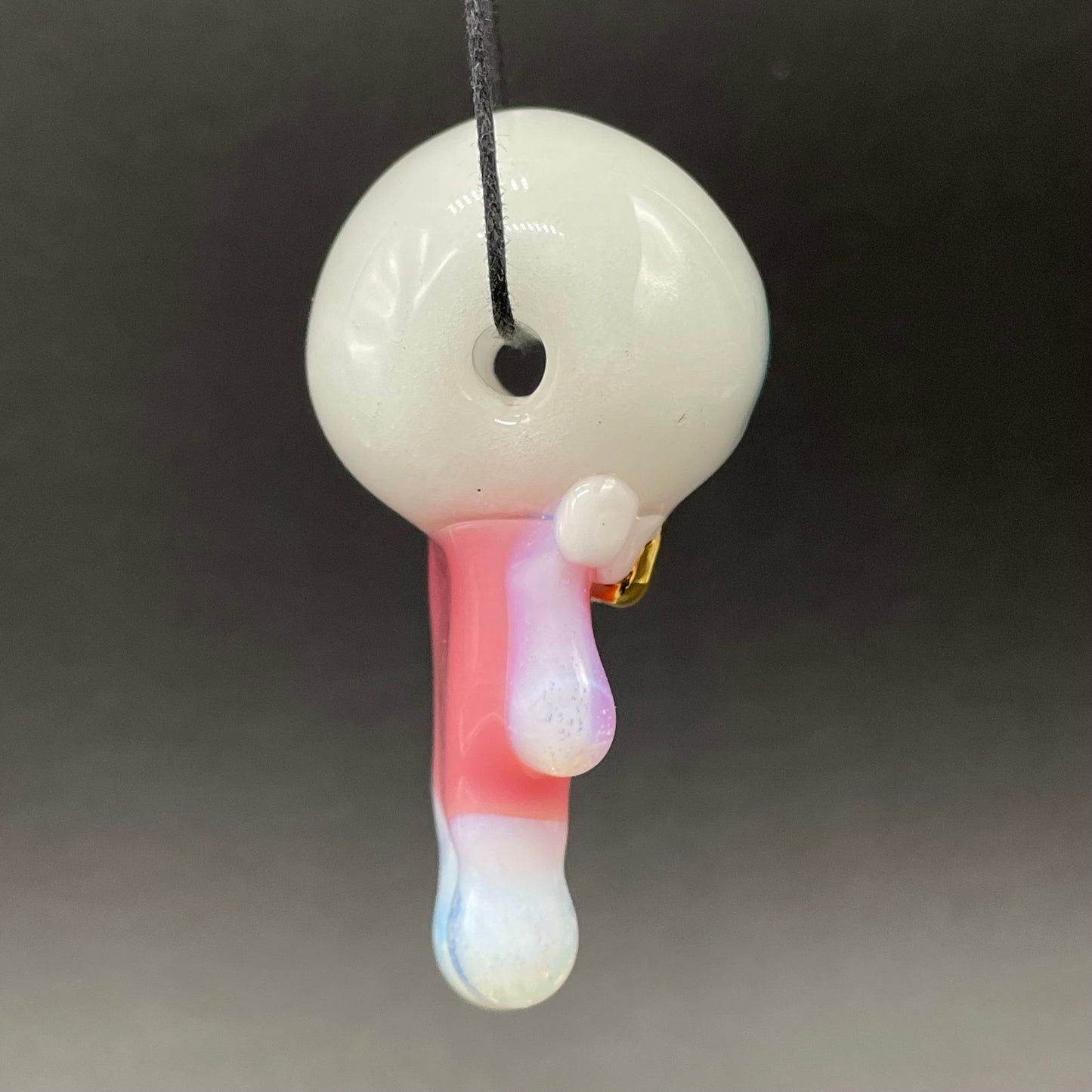 Glow in the dark eye pendant
