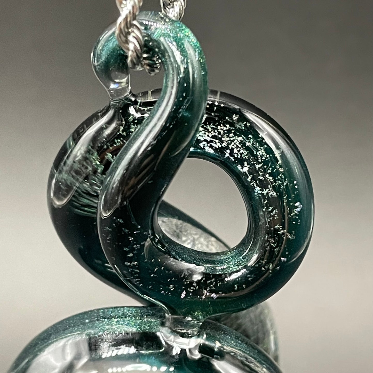 Dichroic sparkle snake pendant