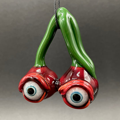 Cherry flavored glass eye pendant
