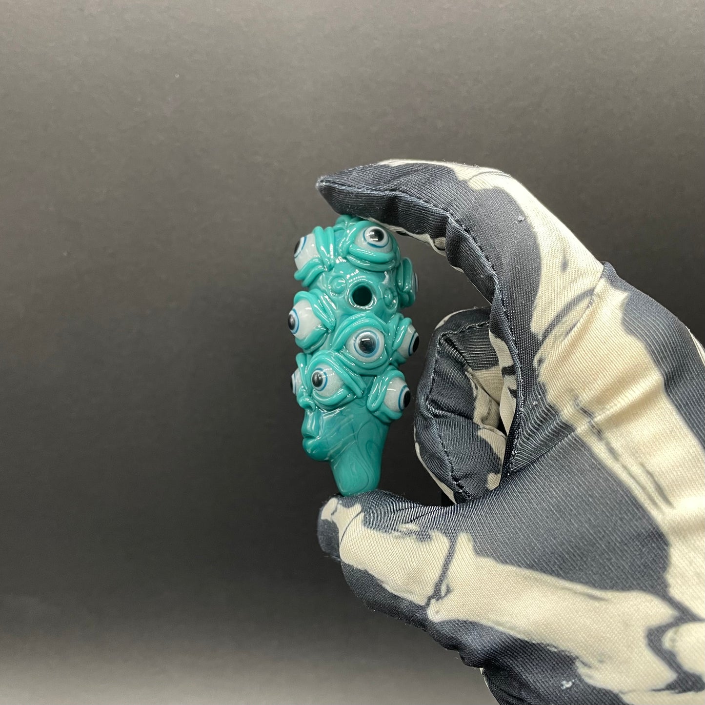 The Never-Blinking One glass effigy pendant