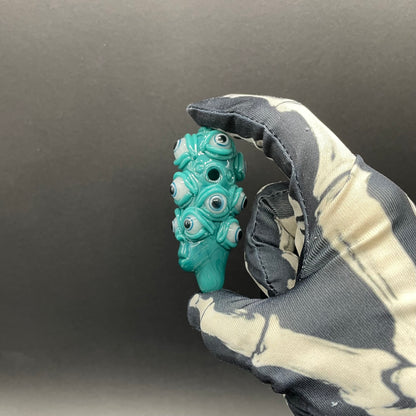 The Never-Blinking One glass effigy pendant