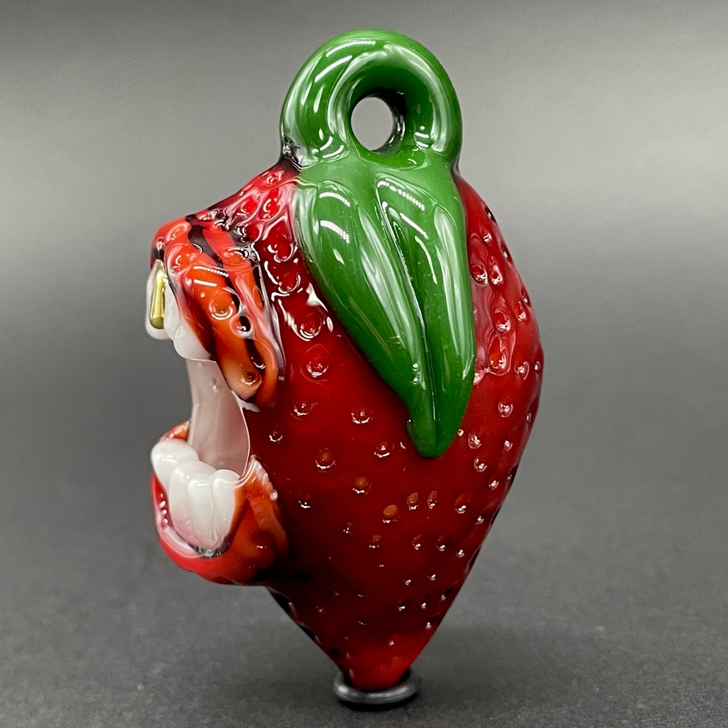 Screaming strawberry glass pendant