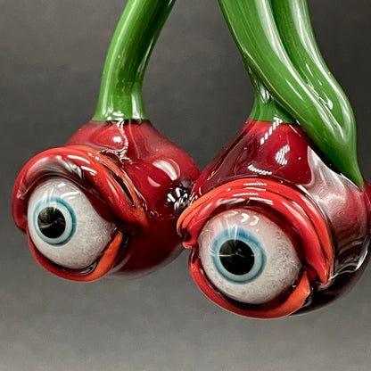 Cherry flavored glass eye pendant