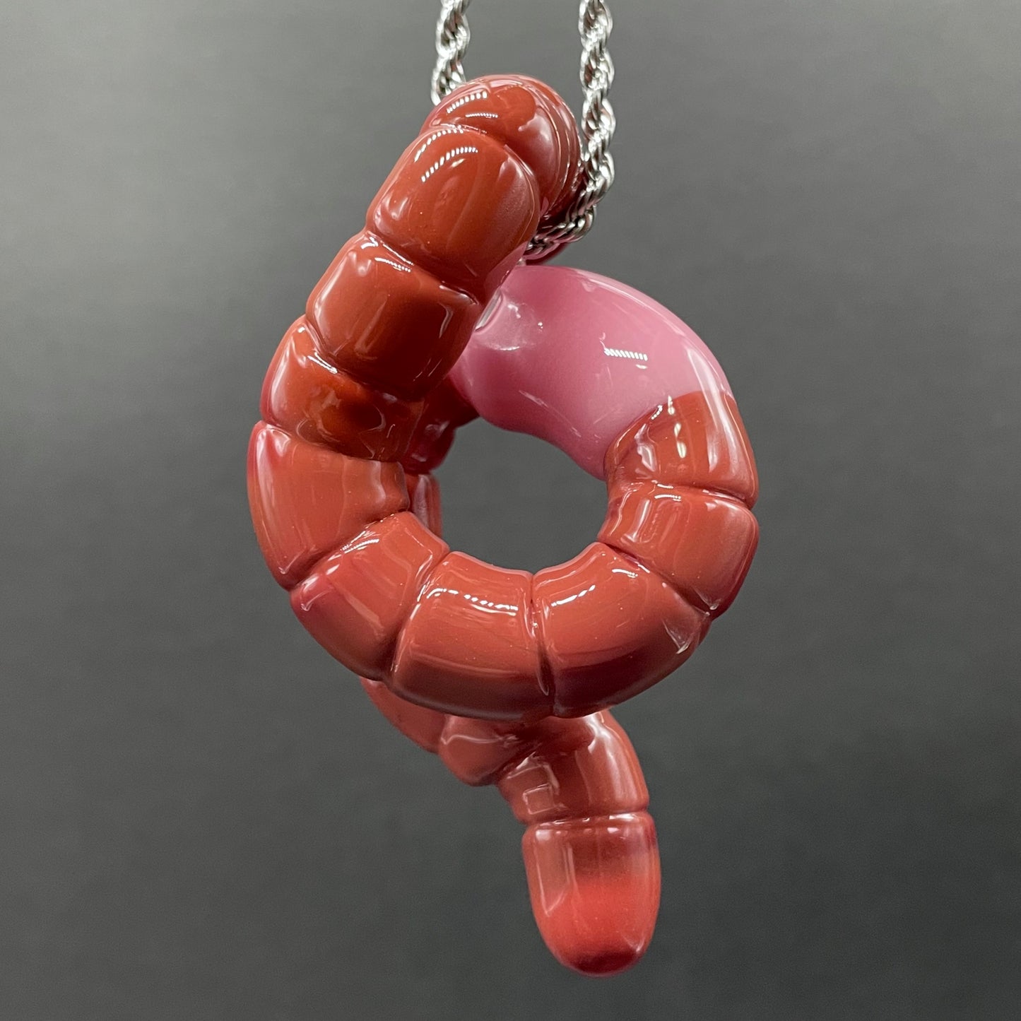 glass earthworm pendant