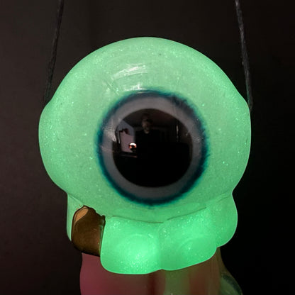 Glow in the dark eye pendant